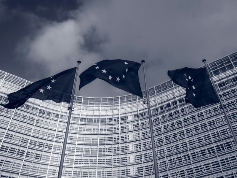 Flags of the European Union in front of the EU-commission building "Berlaymont" in Brussels, Belgium