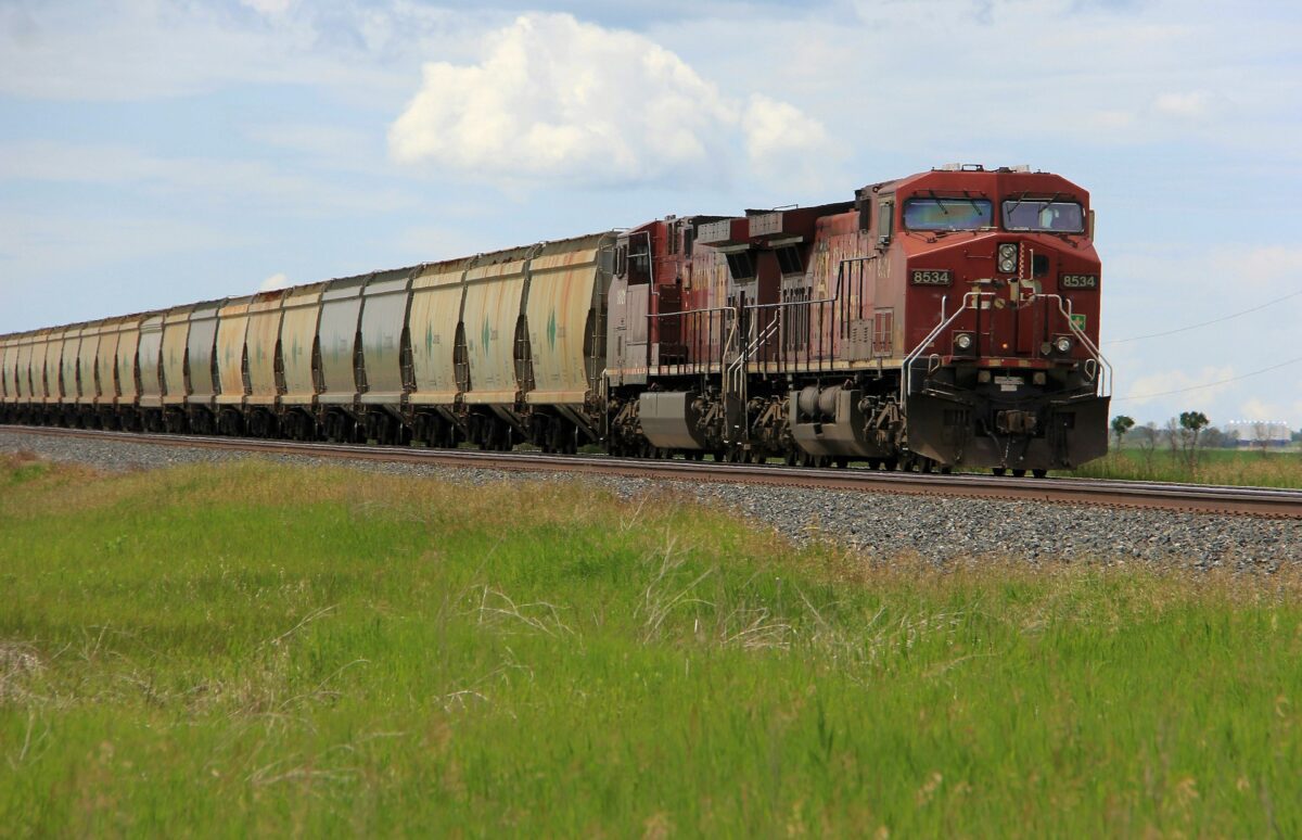 Freight train on a rail corridor representing Iran’s shift toward land trade routes under maritime pressure
