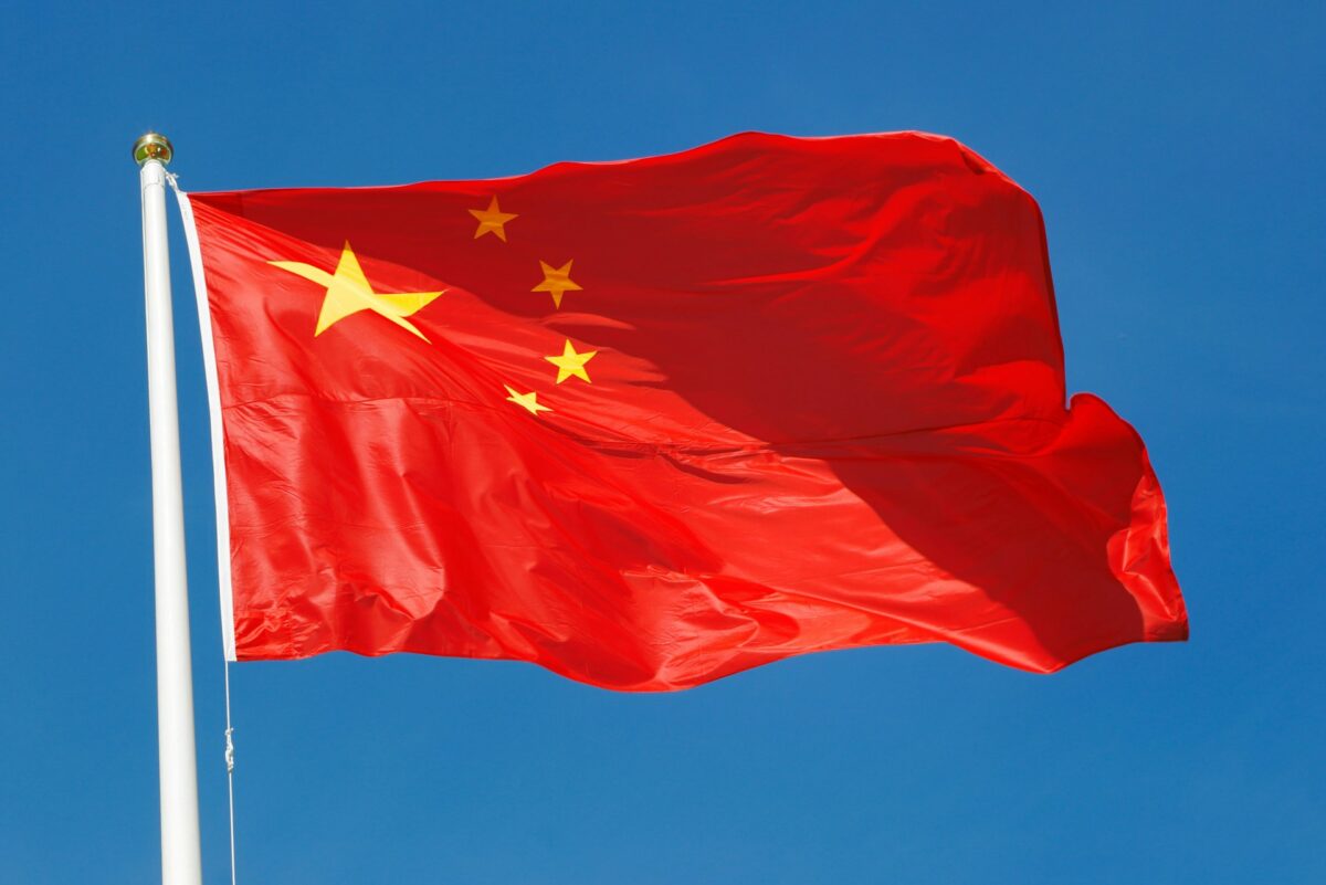 Leaders of China and Serbia sign cooperation agreements during a diplomatic meeting.