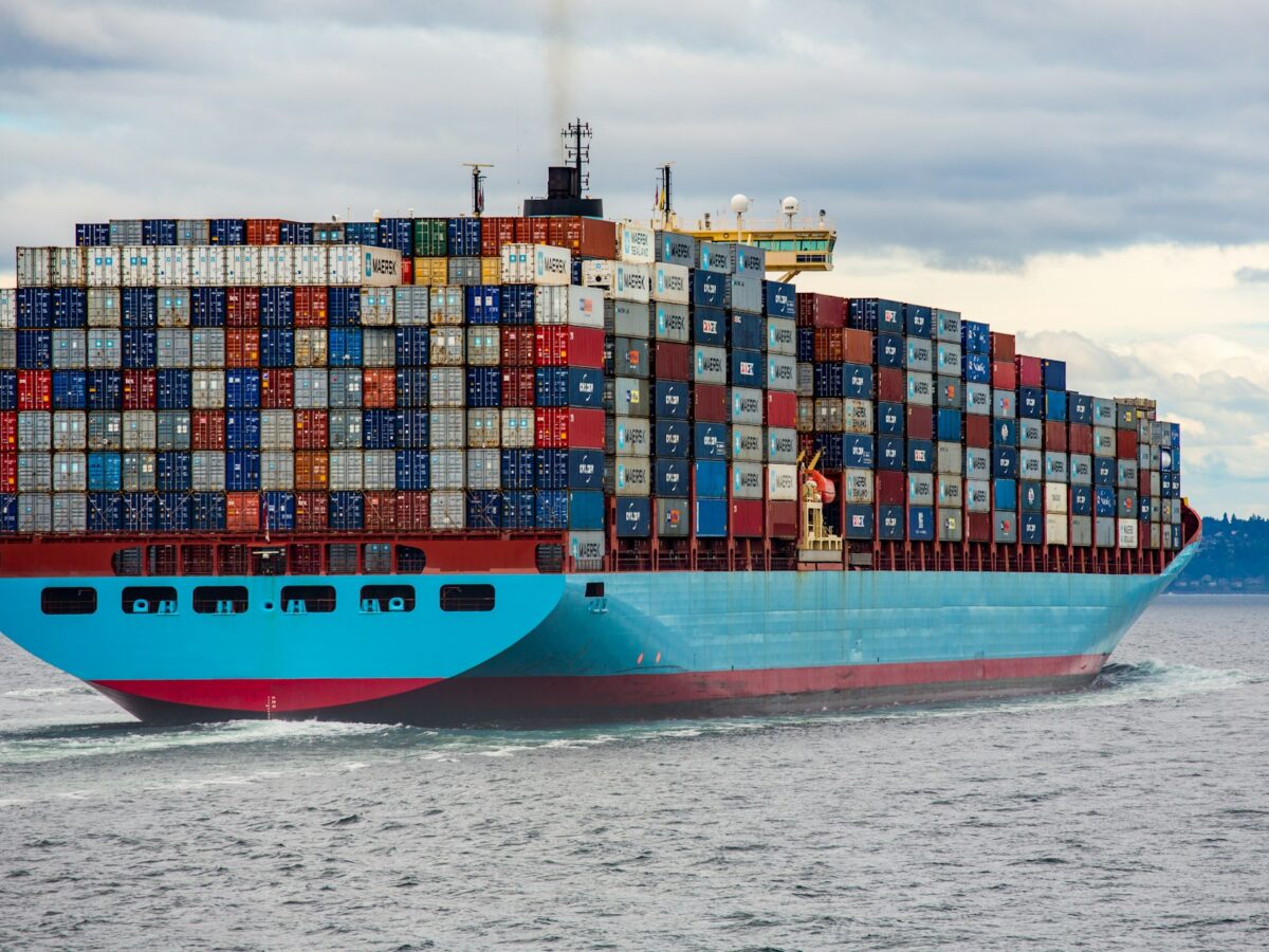 Cargo ship sailing near Somalia as piracy risk adds pressure to global shipping routes.