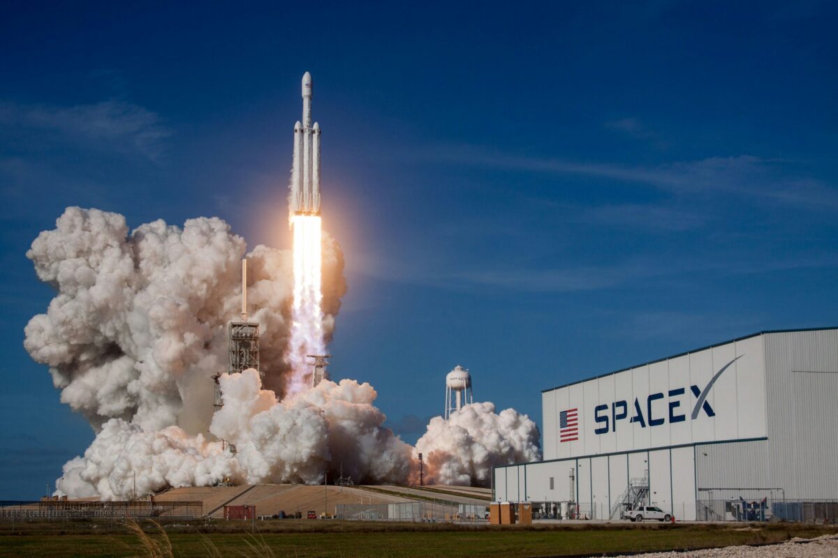 Illustration representing the growing commercial space economy and investor interest surrounding SpaceX’s potential public market debut.