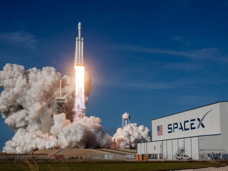 Illustration representing the growing commercial space economy and investor interest surrounding SpaceX’s potential public market debut.
